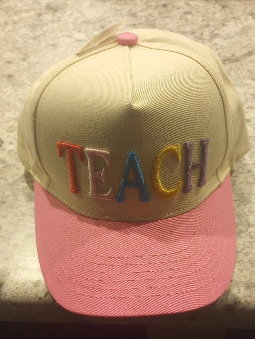 Embroidered "TEACH" Baseball Cap - Cream with Pink Bill